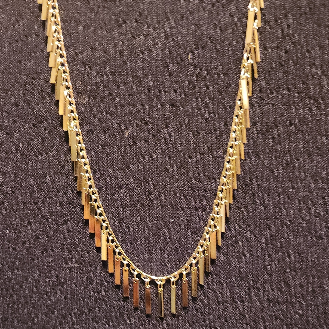 Elegant Gold Necklace With Fringe Detailing
